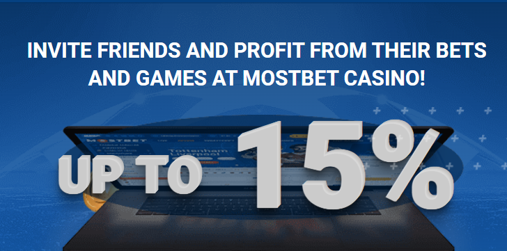 Promo banner of the Mostbet with laptop, and text 'Invite friends. Up to 15%'